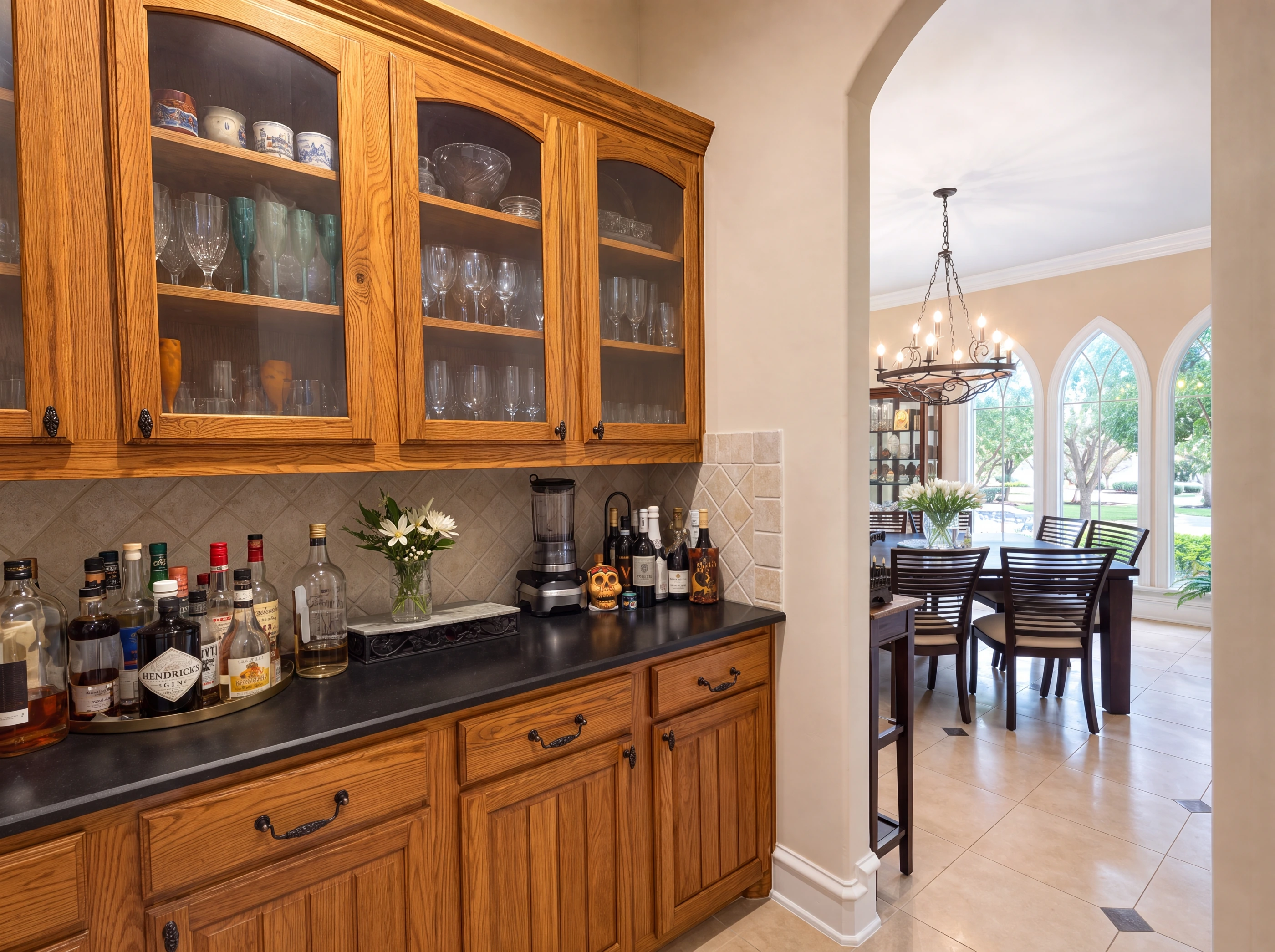 Butler's pantry with glass-front cabinetry
